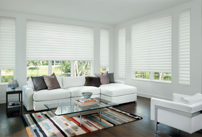 White motorized shades in a living room