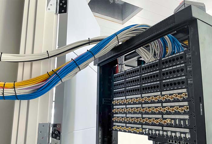 Wires connecting to a network rack