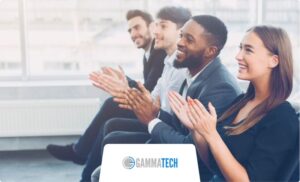 An audience providing a round of applause after a presentation at one of the many Naples tech conferences.